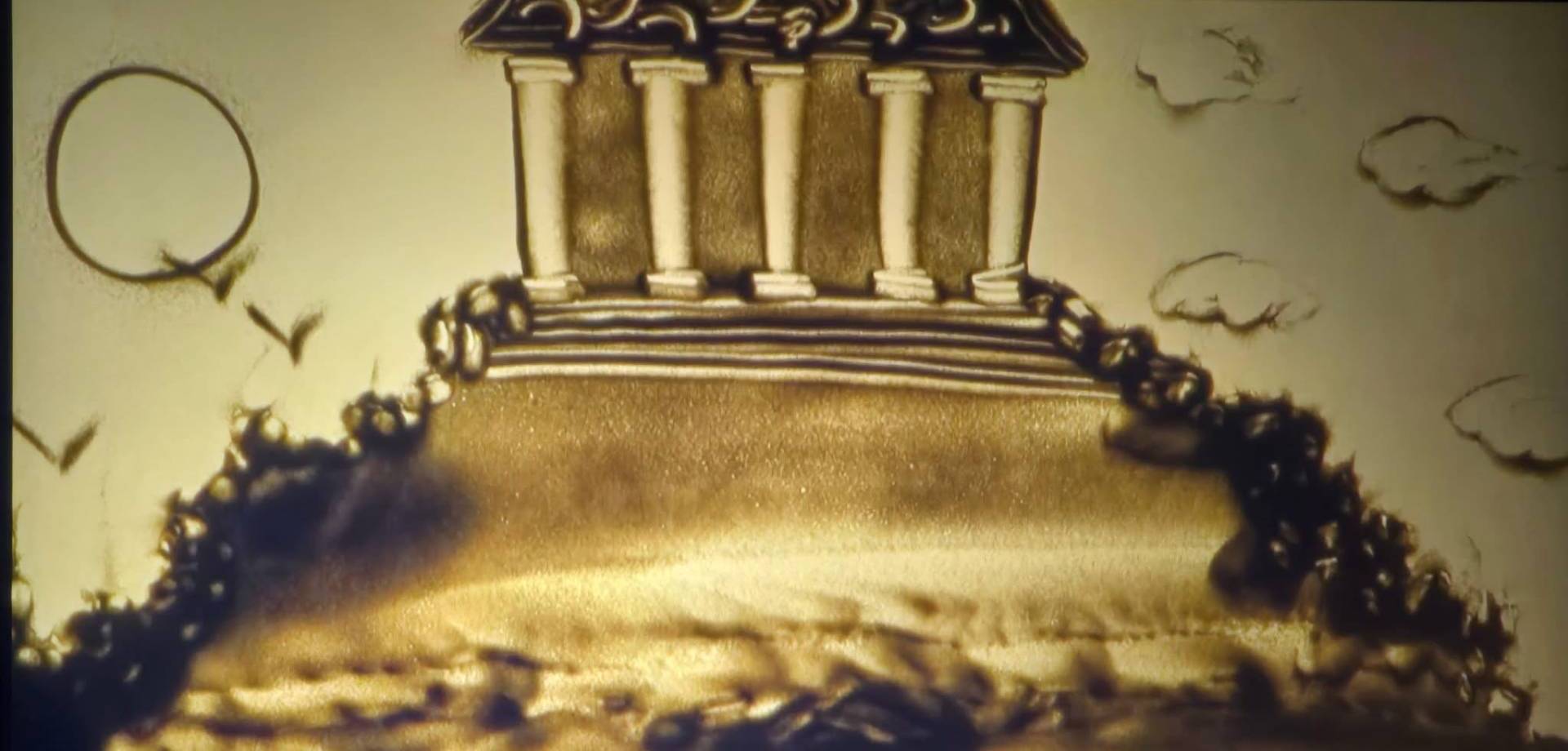 kobiety malujące piaskiem